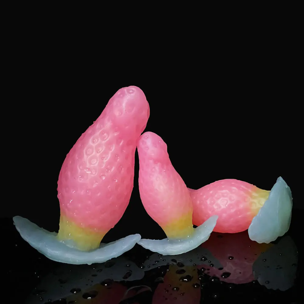 Luminous glow in the dark effect of the AP4141 Strawberry Anal Plug.