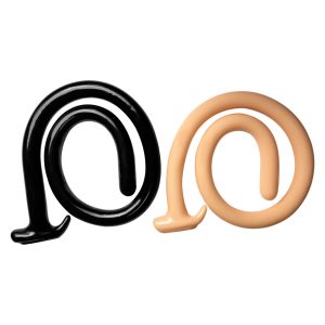 Comparison of black and flesh colored realistic silicone sex toy alternative dragon tails.