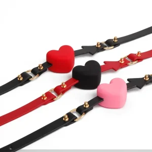 Color variety of the SM4134 BDSM Heart Ball Gag including pink, red, and black.