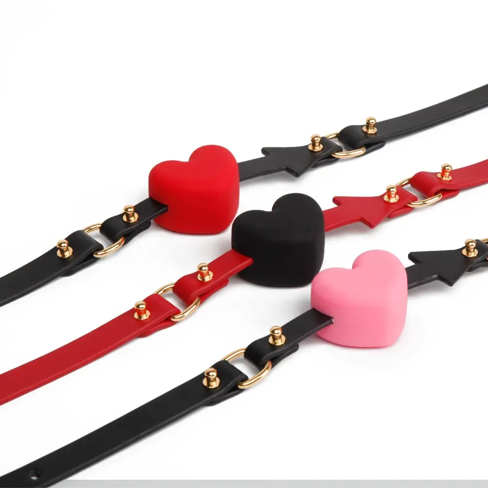 Color variety of the SM4134 BDSM Heart Ball Gag including pink, red, and black.