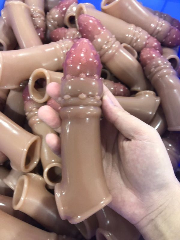 Premium textured silicone penis sleeve with nubbed head and ribbed body - wholesale supplier