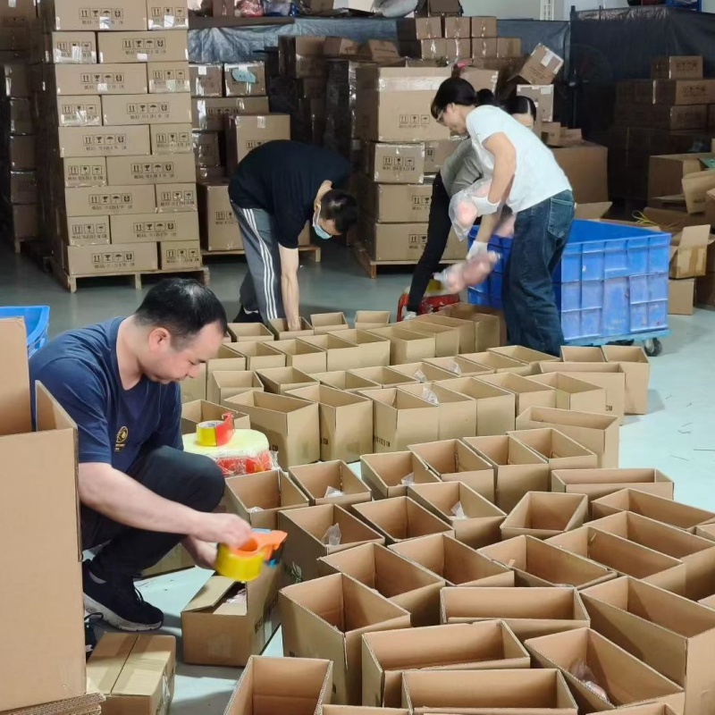 PleasureMo professional packaging team preparing high quality silicone sex dolls for wholesale shipment