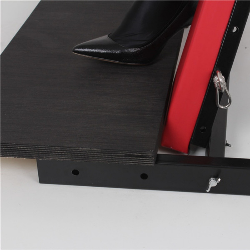 Close-up of X-shaped restraint rack base and structure details