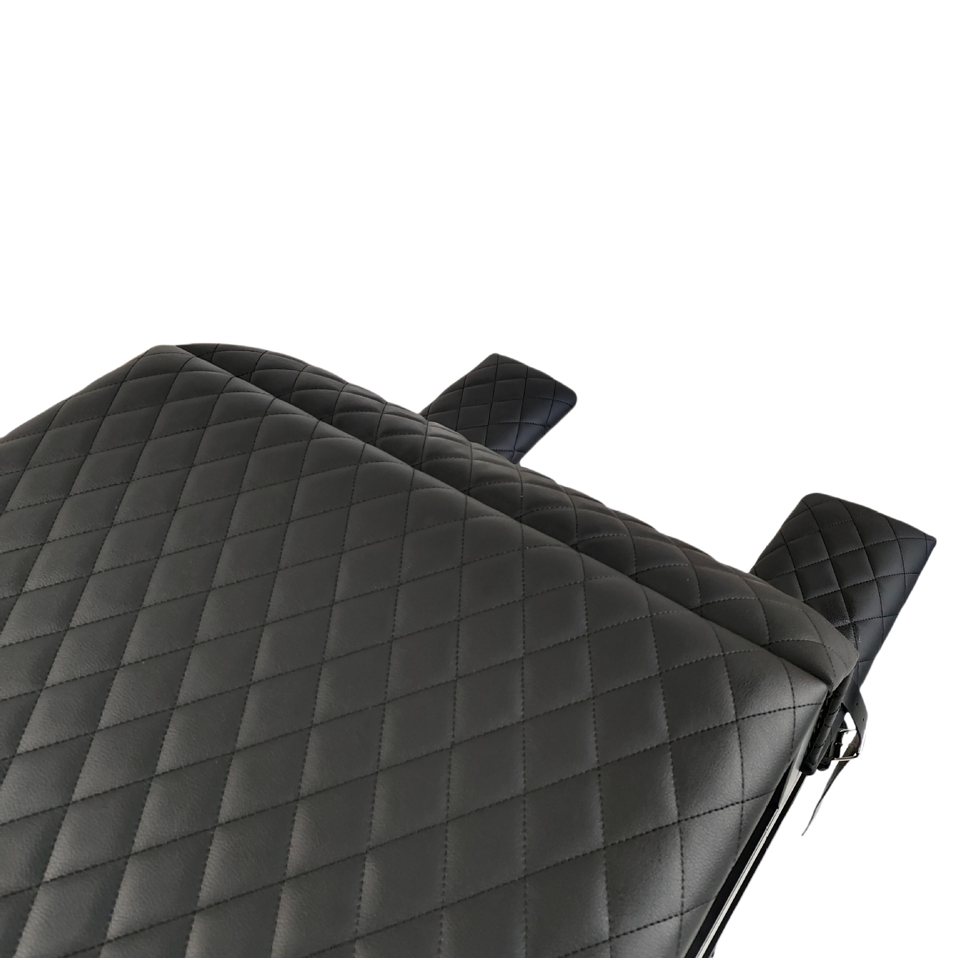 Detail of diamond-stitched black upholstery on SM6121