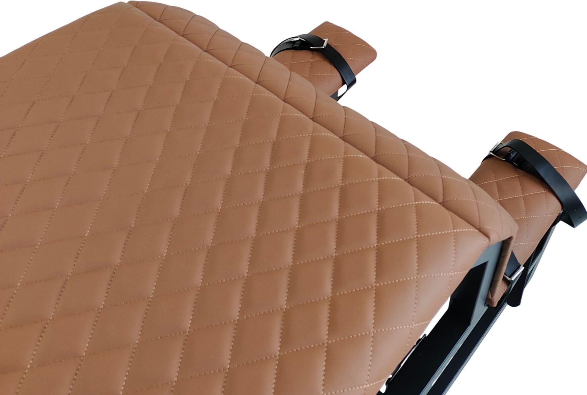 Detail of diamond-stitched brown upholstery on SM6121