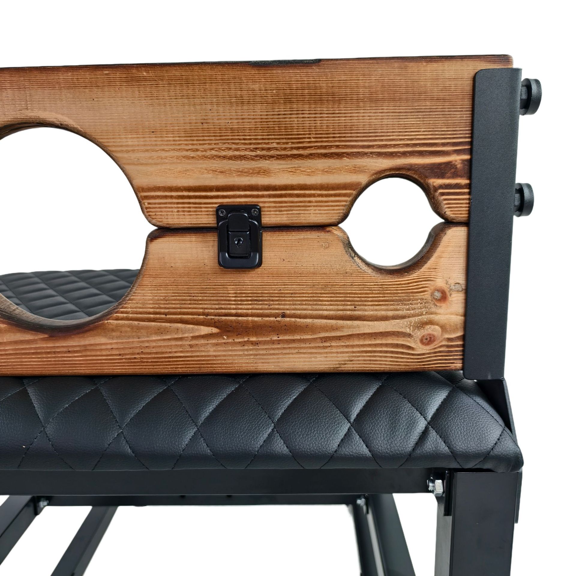 Detailed view of the wooden pillory openings on the SM6122