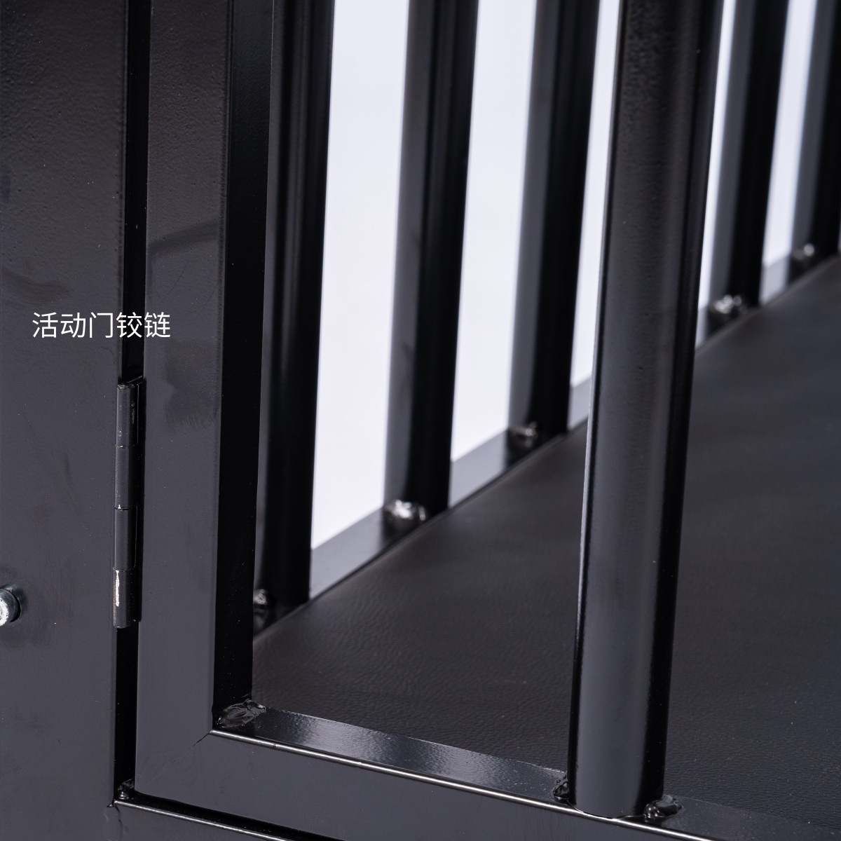 Detailed view of the door hinge on the SM6908 BDSM metal cage