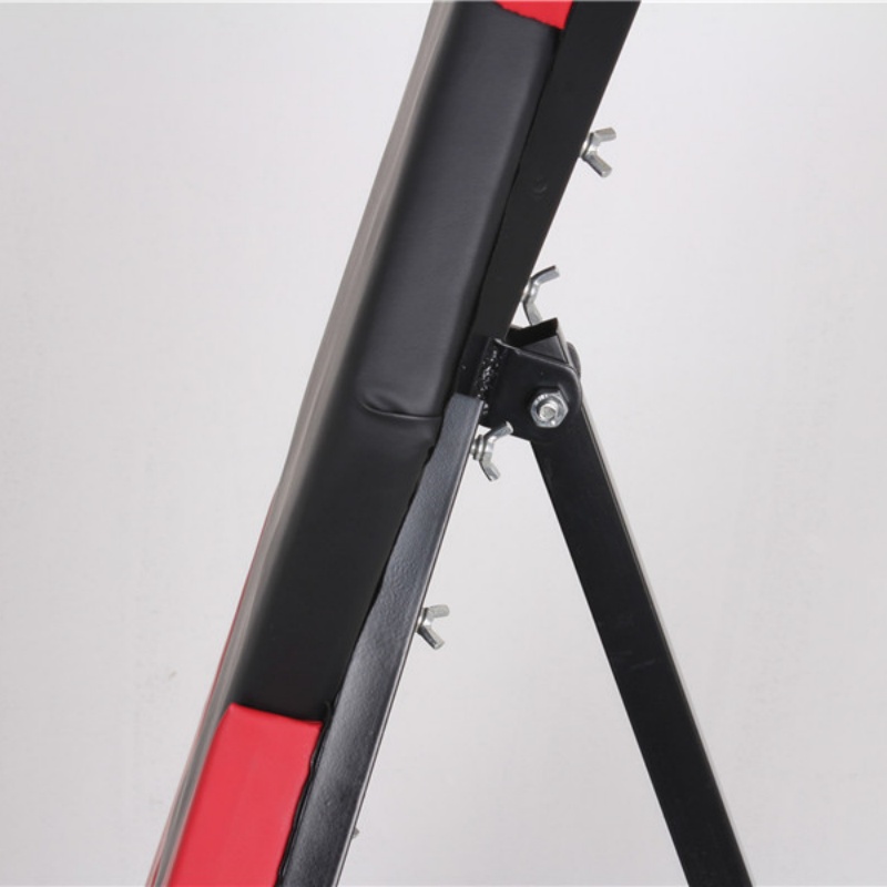 Padded detail of professional X-shaped restraint rack for comfort