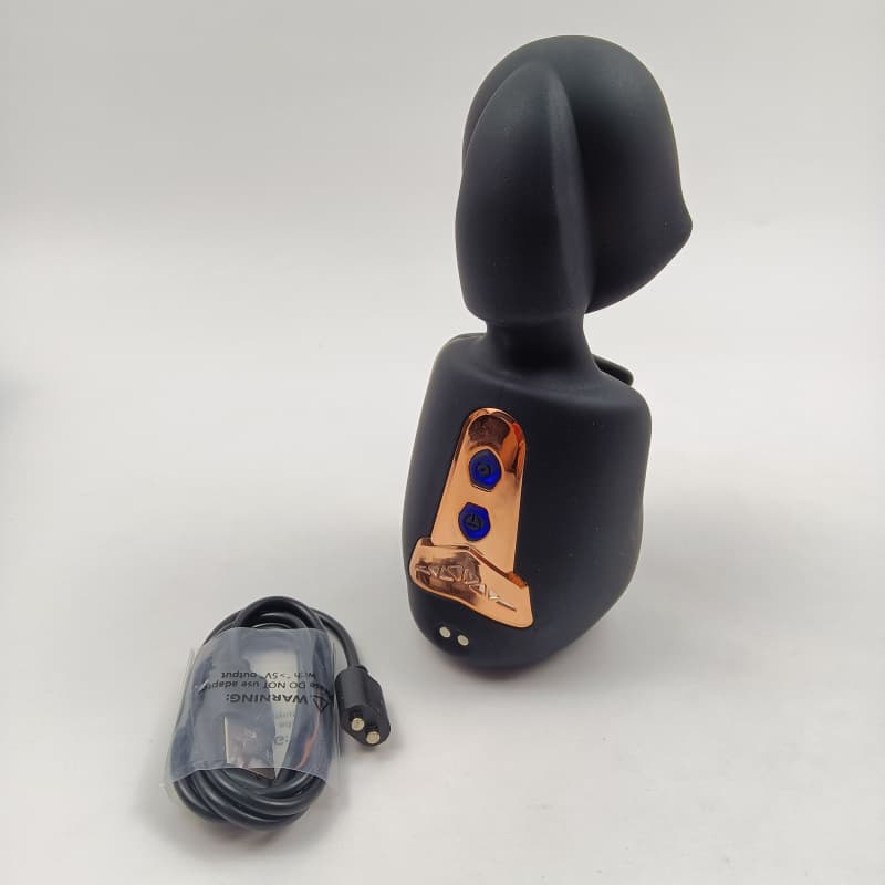 Control buttons, metallic accents, and magnetic charging cable layout
