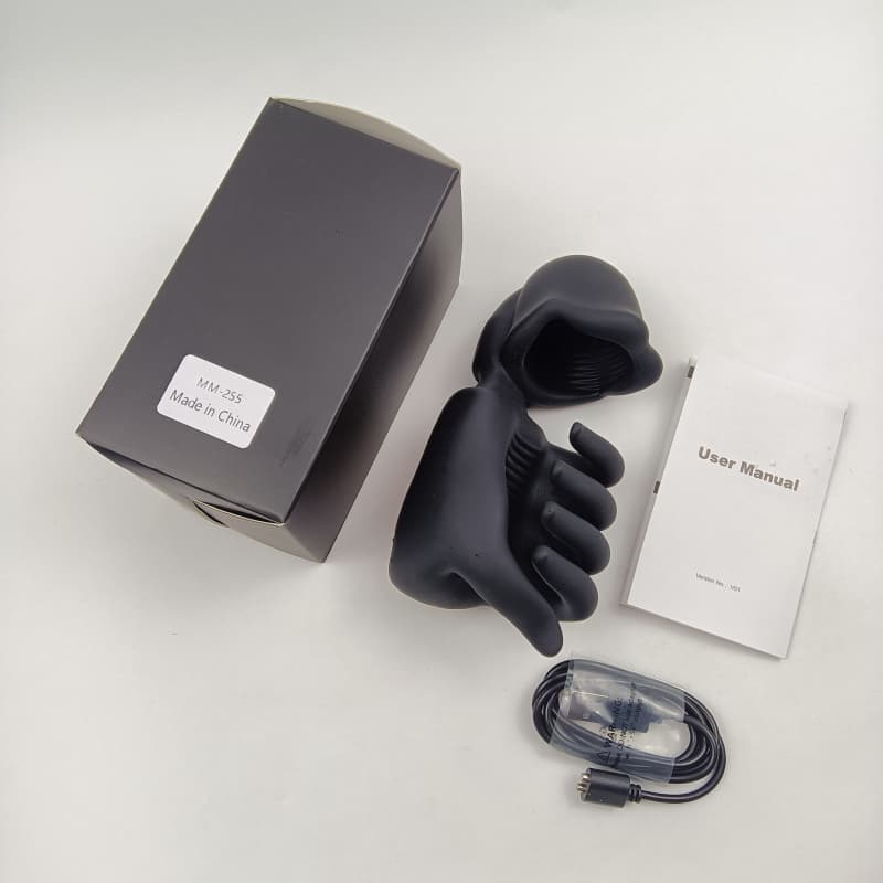 Complete package contents including device, manual, and magnetic charging cable