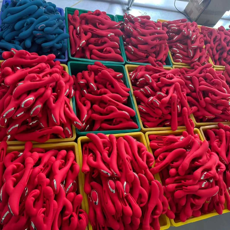 Semi-finished adult toy products stored in factory production bins before final processing