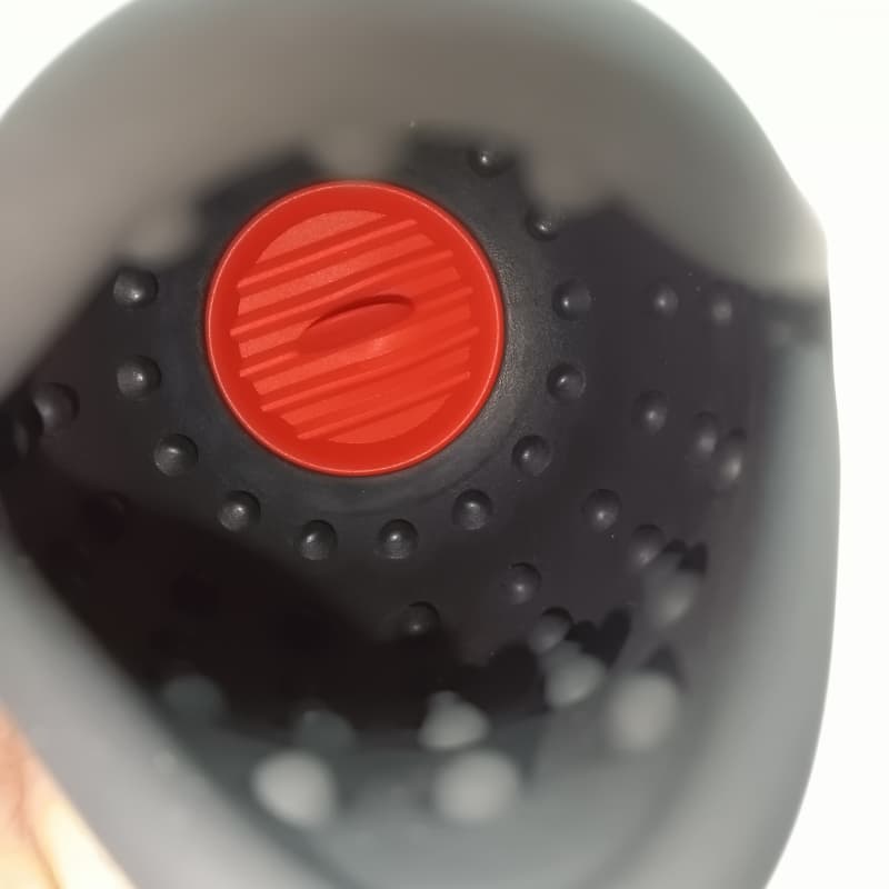 Close-up view of the internal tongue-licking node and textured nubs inside the whale penis trainer